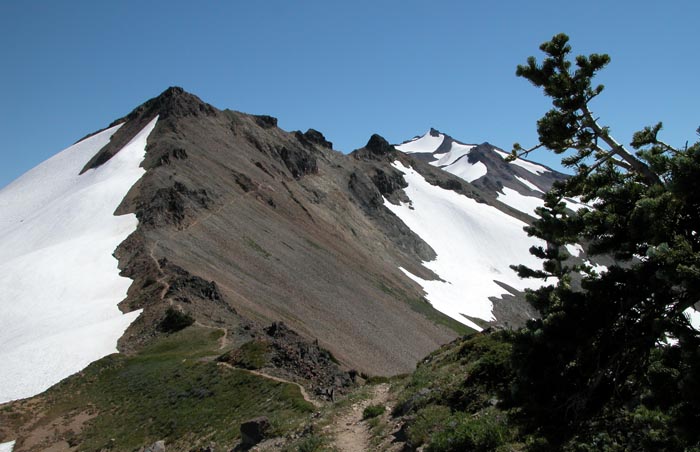 Looking south along the route of the PCT from Elk Pass, to the  8,000 foot peak of Old Snowy mountain 