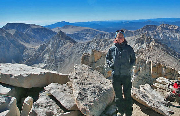 3 September: Yvonne standing on the 14,495' summit of Mt. Whitney