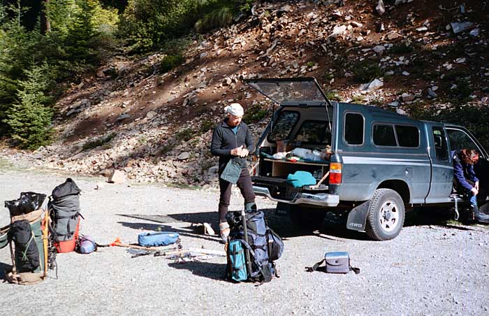 1997: At Whitewater trailhead, preparing our gear - Peter, Lucy and Mal Hill