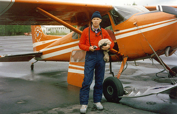 Peter at the Talkeetna airport with a Hudson Air Cessna 185 skiplane.