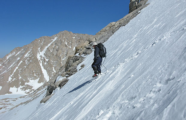 May 2009: Jim Keogh using crampons on our descent from Trail Crest. 