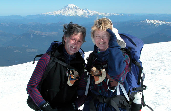 Ken and Lee on the summit of Mt. Adams with Mt Rainier behind and to the north of them