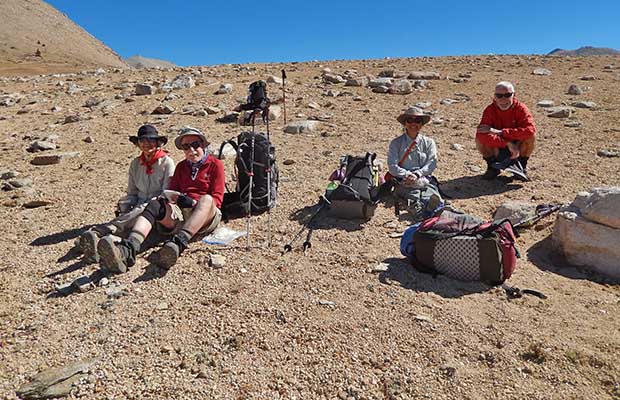 Louise, Mark, Jeanne and Bob resting on the highest point of the Bighorn Plateau