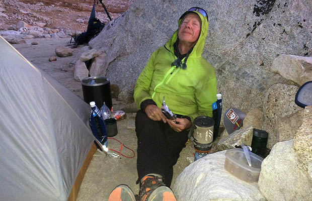 Peter, really relaxed between tent and rock at Guitar Lake.