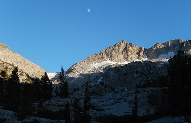 An evening image of the moon and Mount Izaak Walton (12,100').