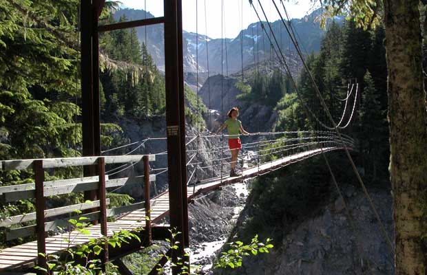 The suspension bridge that crosses the deep wash-out of Tahoma Creek