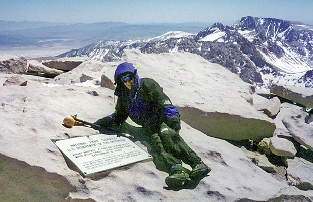 April-May 1996: Lucy resting on the summit of Mt. Whitney.